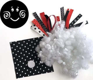 "Ušiju si černé sluníčko"